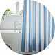 Argos Home striped shower curtain in blue and white colour.
