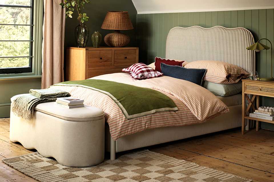 Green bedroom with bold colours.