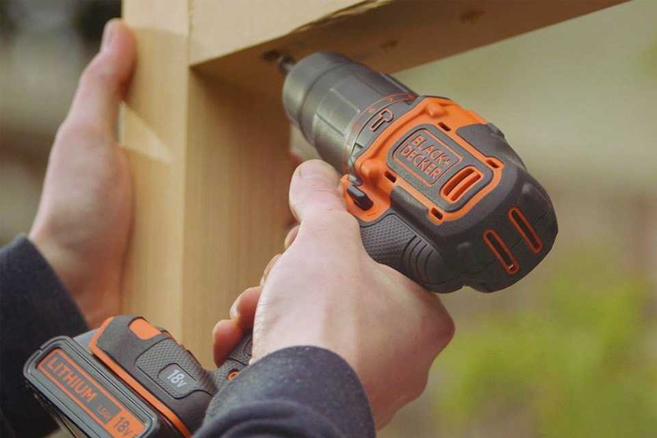 Black + Decker 18V Cordless Hammer Drill with Battery.