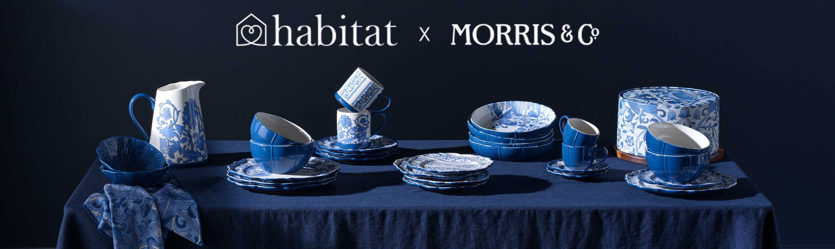 A banner for the Habitat x Morris and Co. collaboration with blue patterned plates, bowls and cups.