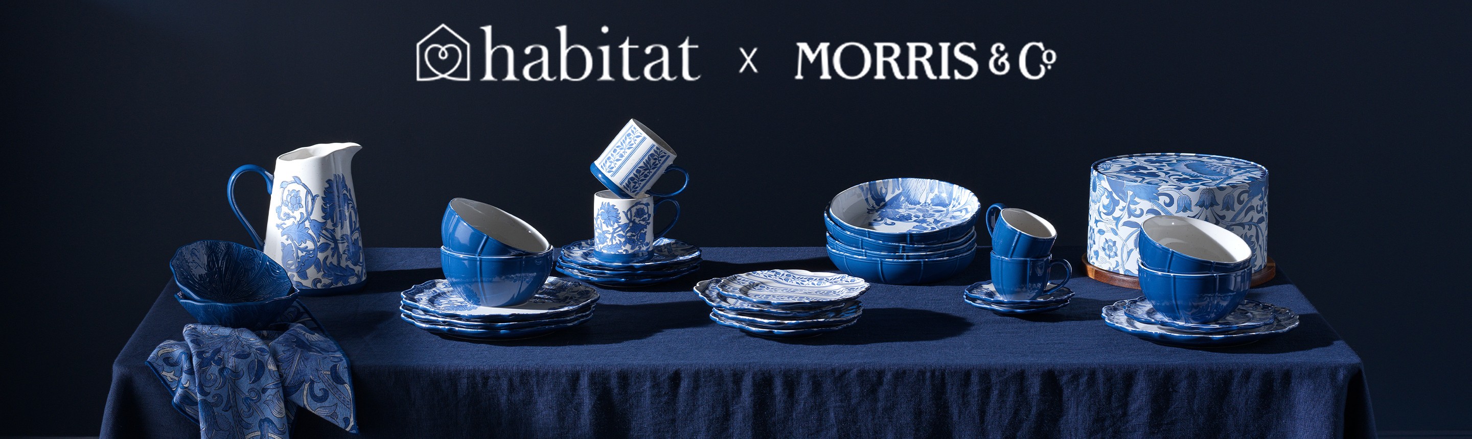 A banner for the Habitat x Morris and Co. collaboration with blue patterned plates, bowls and cups.