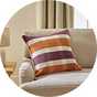 Argos Home Autumn Check Blanket Stitch Cushion on a sofa.