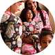 Family wearing matching Christmas pyjamas while celebrating festive moments together.