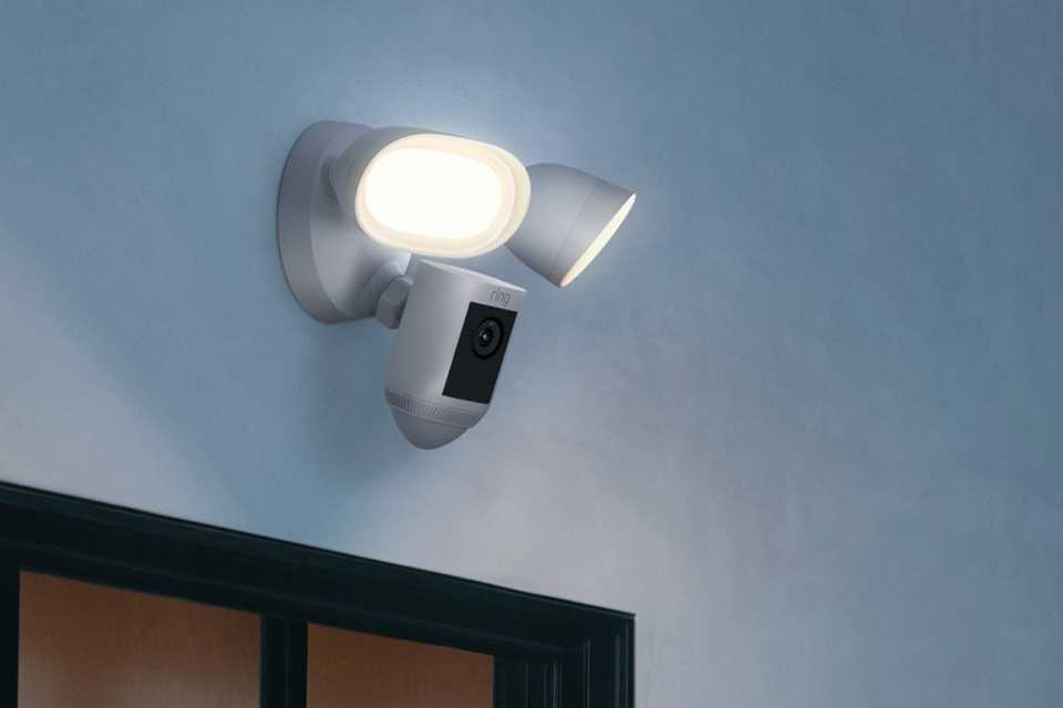 Ring Floodlight camera wired pro installed on a wall.