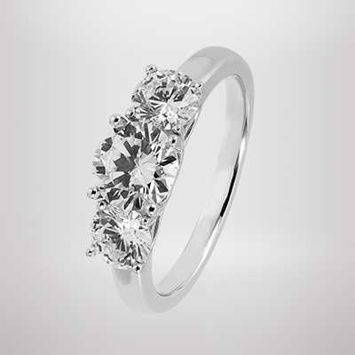A Revere Sterling Silver Round Cubic Zirconia Wedding Ring in size K.