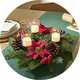 An Argos Home Poinsettia and Berry Centrepiece Wreath with Candle Holder.