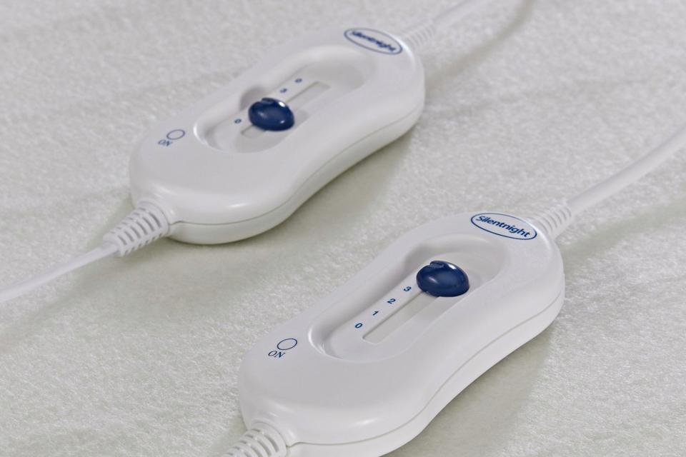 Dual controls for a double electric blanket.