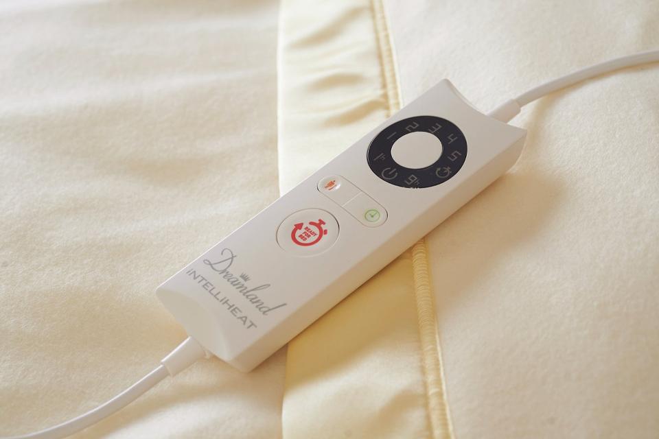 Electric blanket controller on bed.