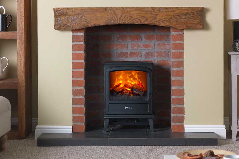 black cast iron freestanding stove fireplace.