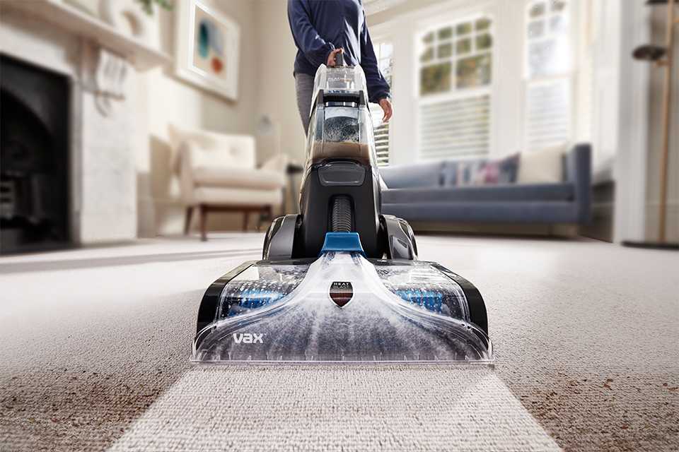 A carpet cleaner in use.