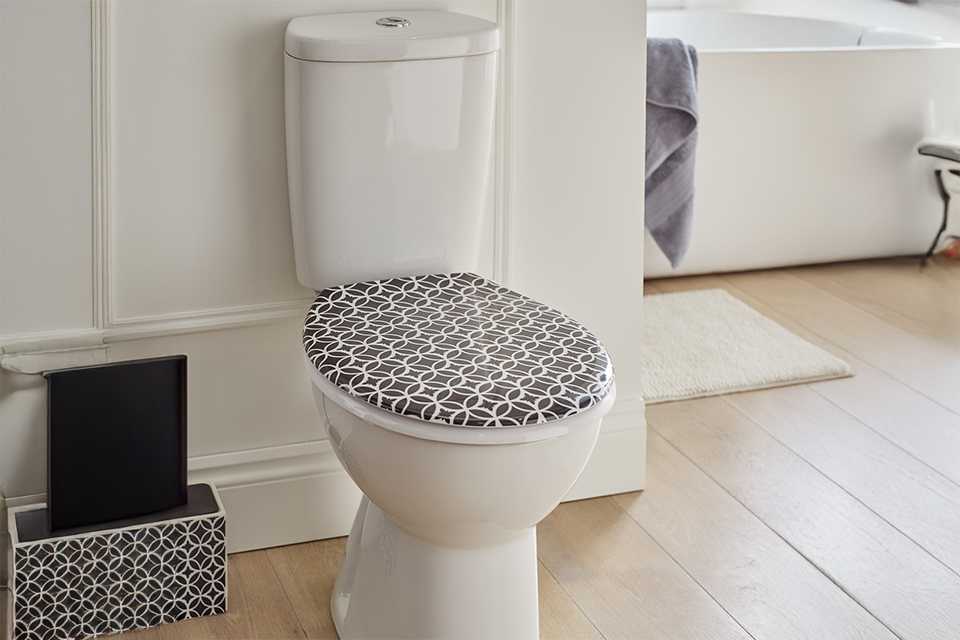 An Argos Home printed toilet seat in black and white.