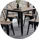A Julien Bowen Grafton square dining table with some chairs.
