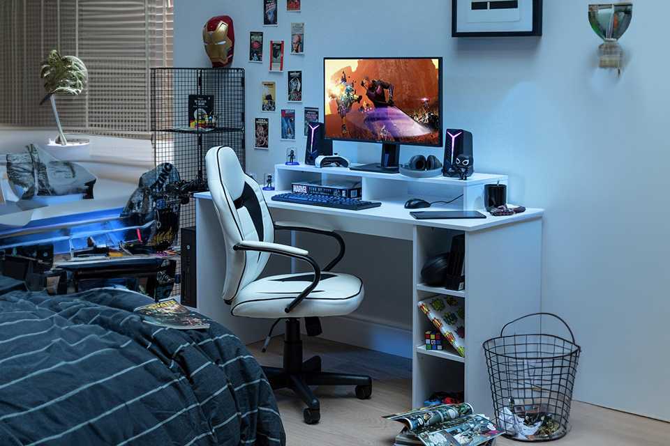 Argos Home gaming desk in white placed in a bedroom.
