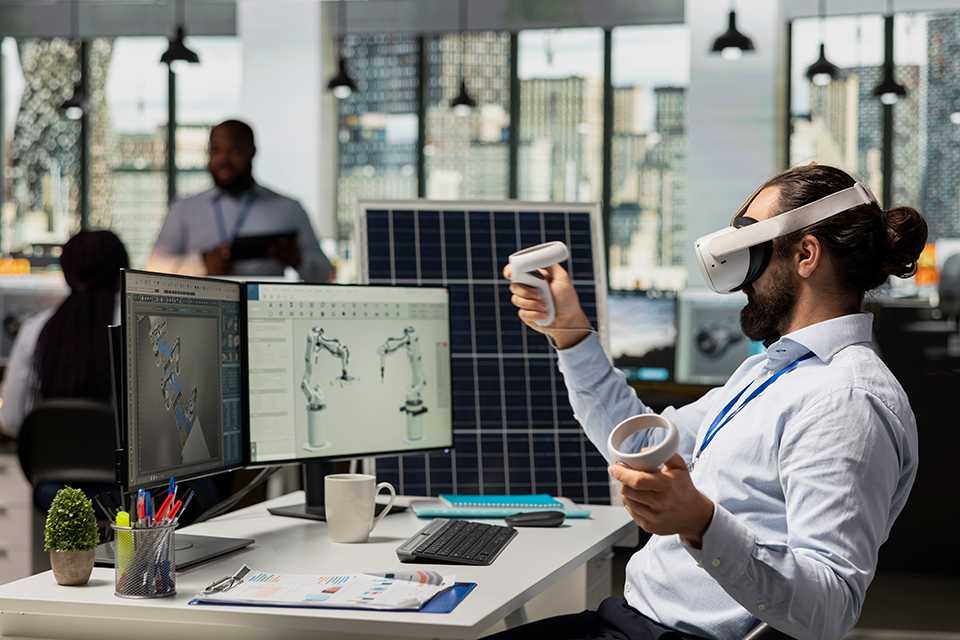 A man using VR headset for work in an office.