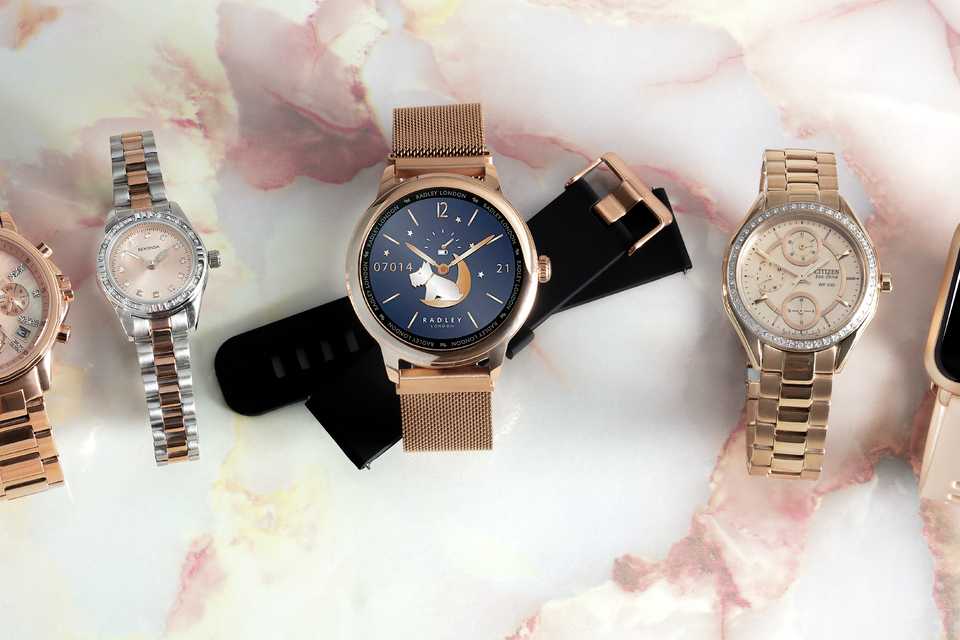 Elegant watches on display on a countertop.