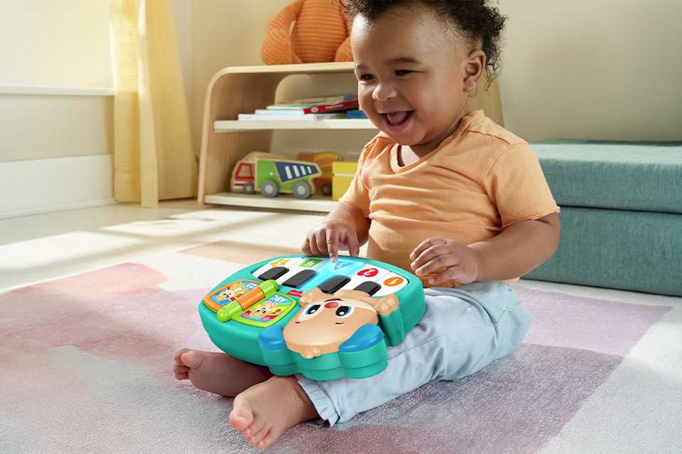 Laugh & Learn Puppy's Piano, Baby & Toddler Musical Toy.