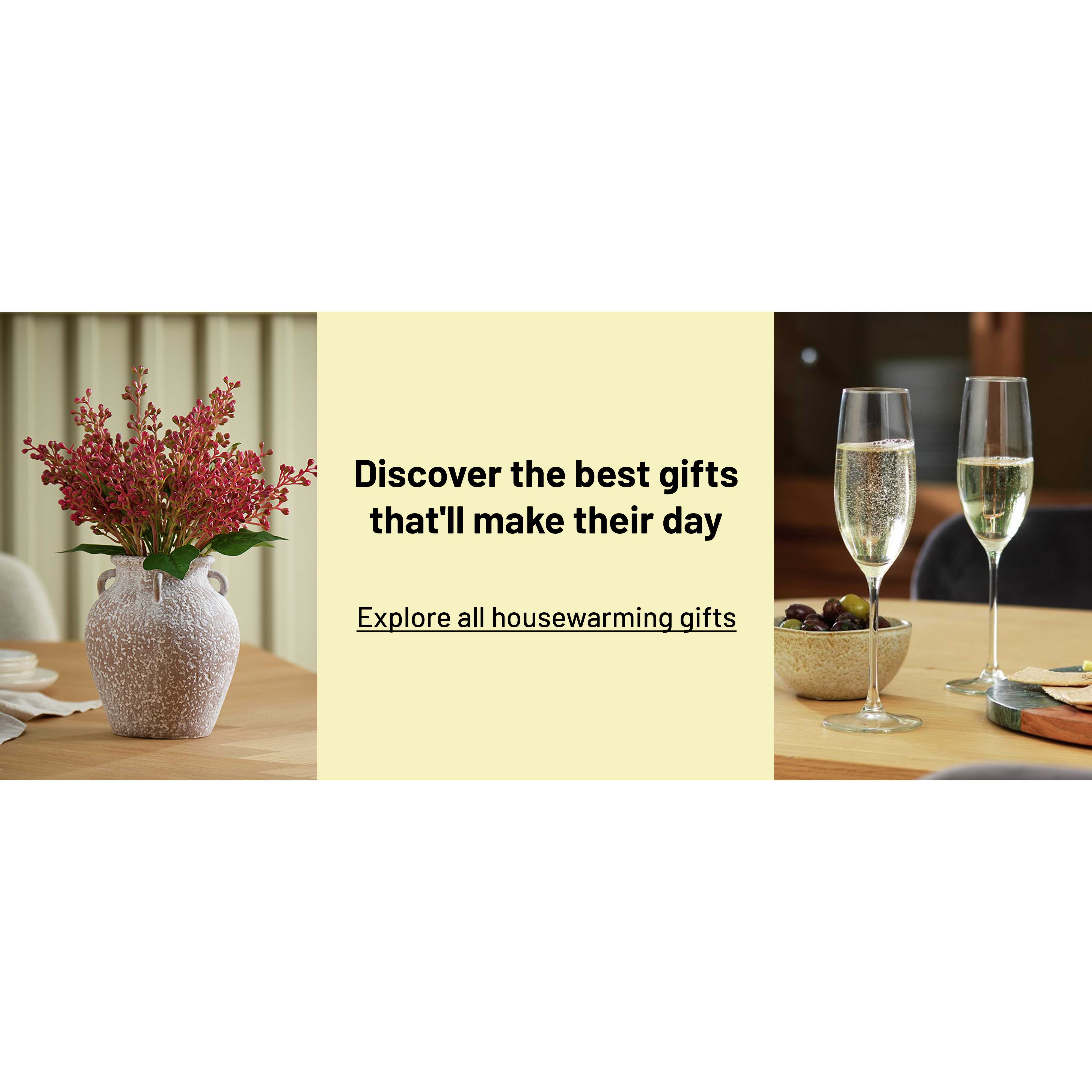 A banner with a plant in a vase and 4 wine glasses on a table.