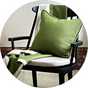 A green 50x50cm Habitat Blanket Stitch Cushion.