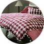 A 200x220cm Habitat Gingham Quilted Bedspread in berry.