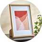 A Habitat Oak Effect 8x12" A4 Wooden Picture Frame.
