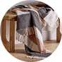 A Habitat neutral striped Faux Mohair Throw.