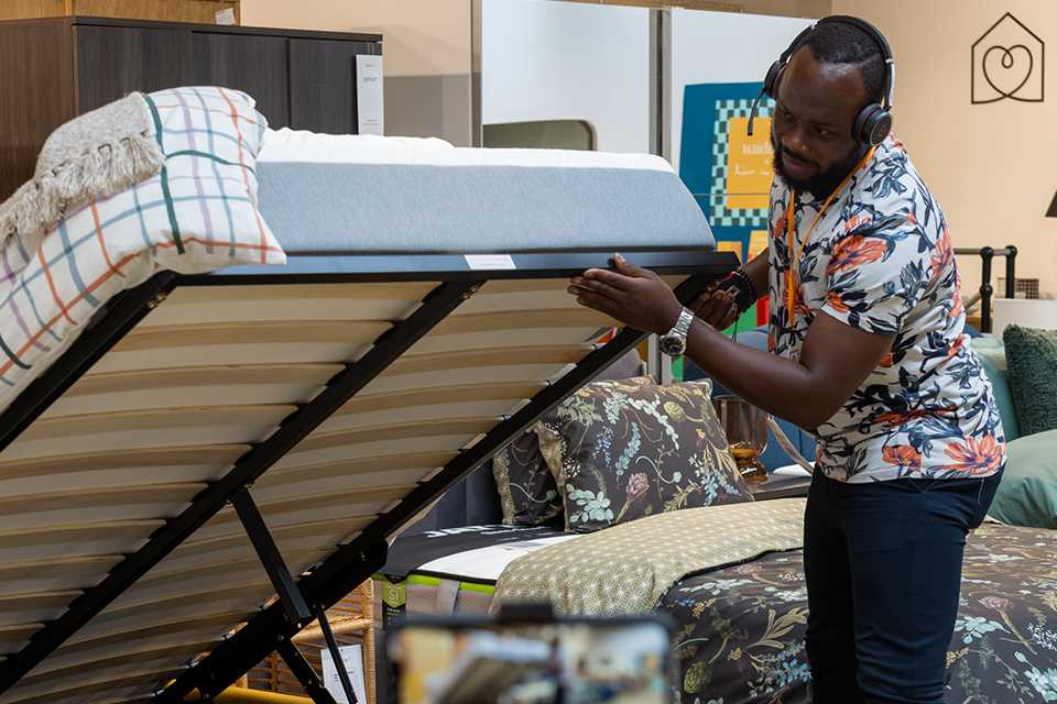 Man in habitat showroom.