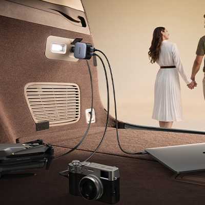 UGREEN 90W Car Charger with 60W Retractable USB-C Cable in a car.