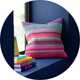 A Habitat x Margo Selby colourful patterned cushion.