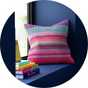 A Habitat x Margo Selby colourful patterned cushion.