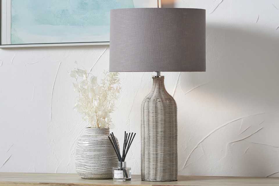 Pacific Anika Rattan Bottle Table Lamp in grey colour.