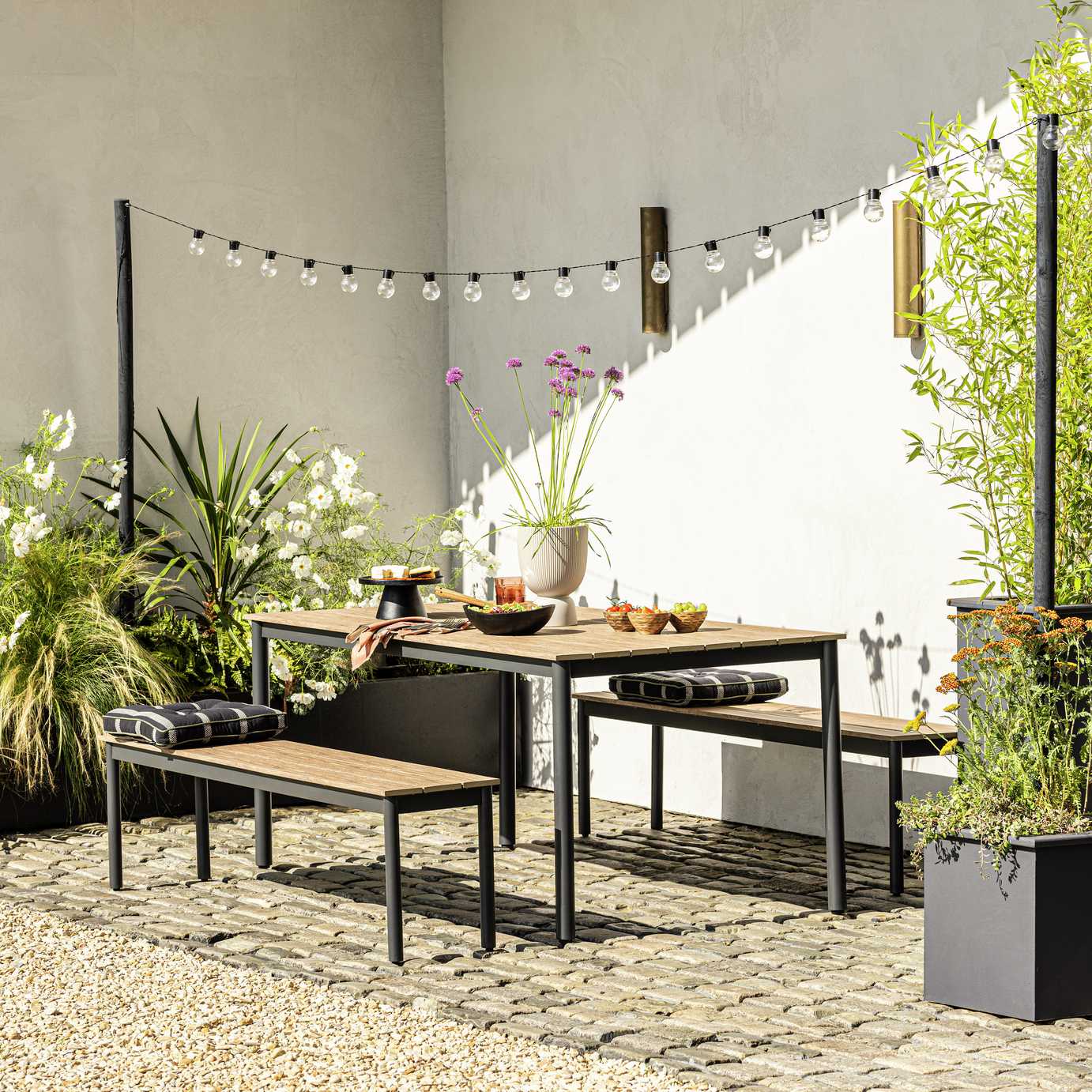 Habitat Loft Living 6 Seater Wooden Patio Set on a patio