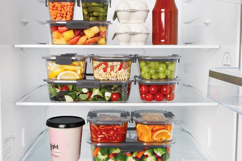 Food neatly stacked in storage containers.