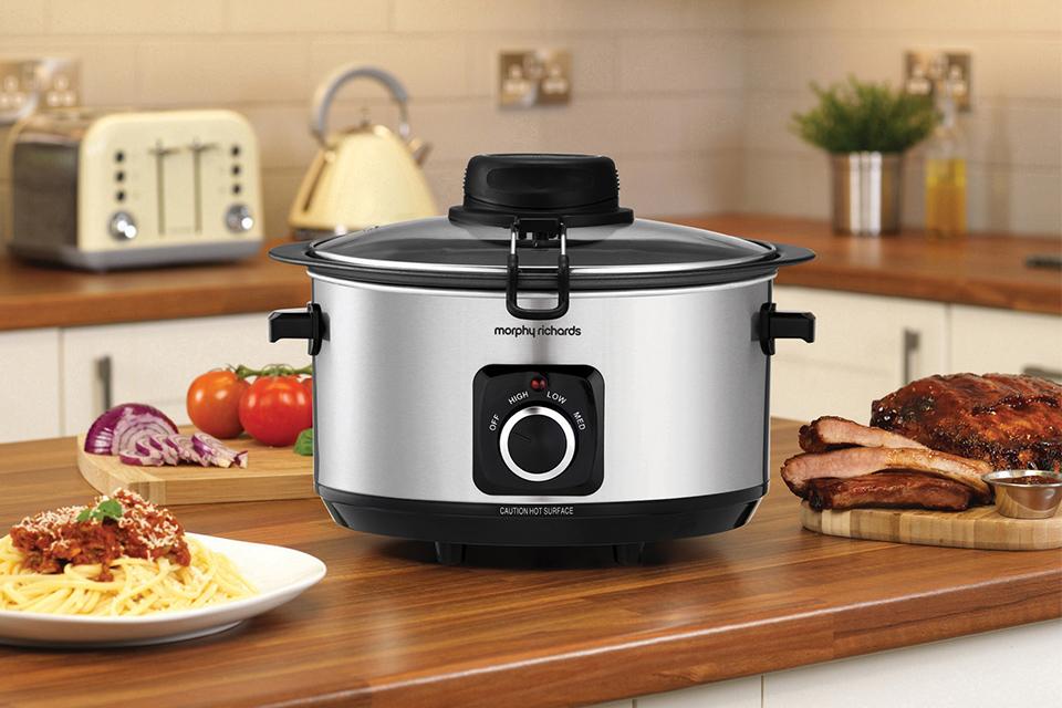 Slow cooker on kitchen side.