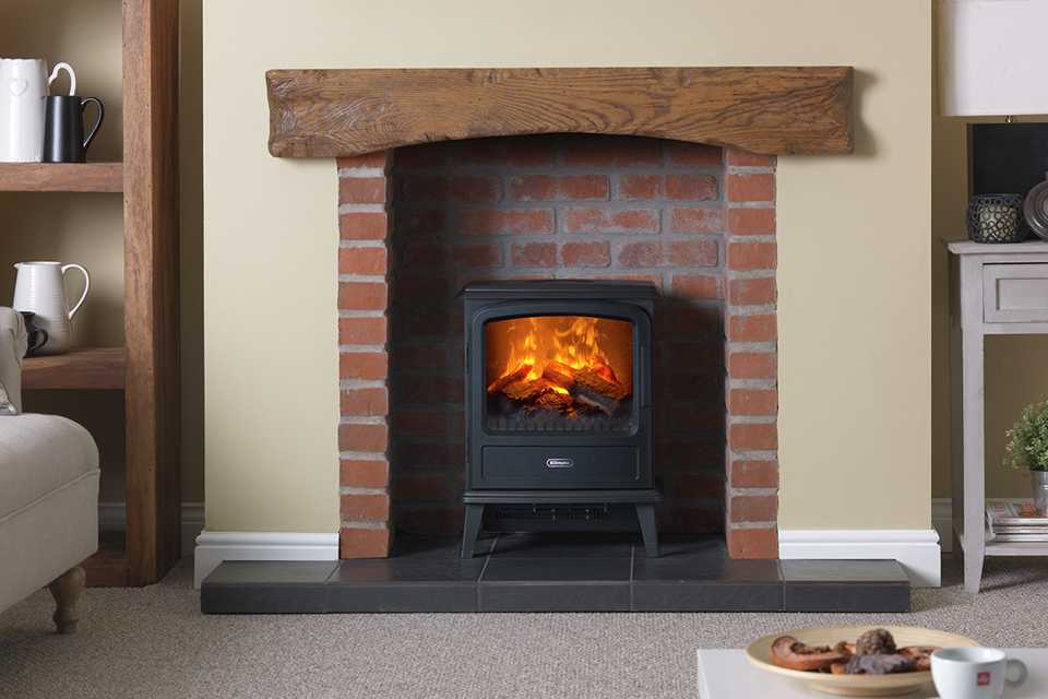 Electric stove burner in chimney alcove.
