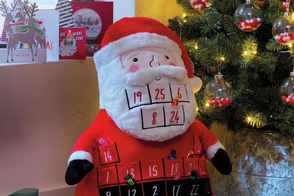 A giant Santa countdown plush toy.