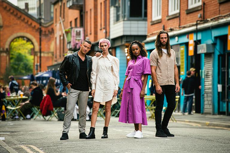 Two men and two women are pictured, with hair styles ranging from long, sleek and natural to curly, spiky and dyed pink.