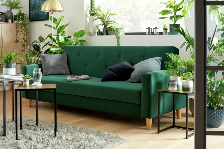 Green sofa in living room.