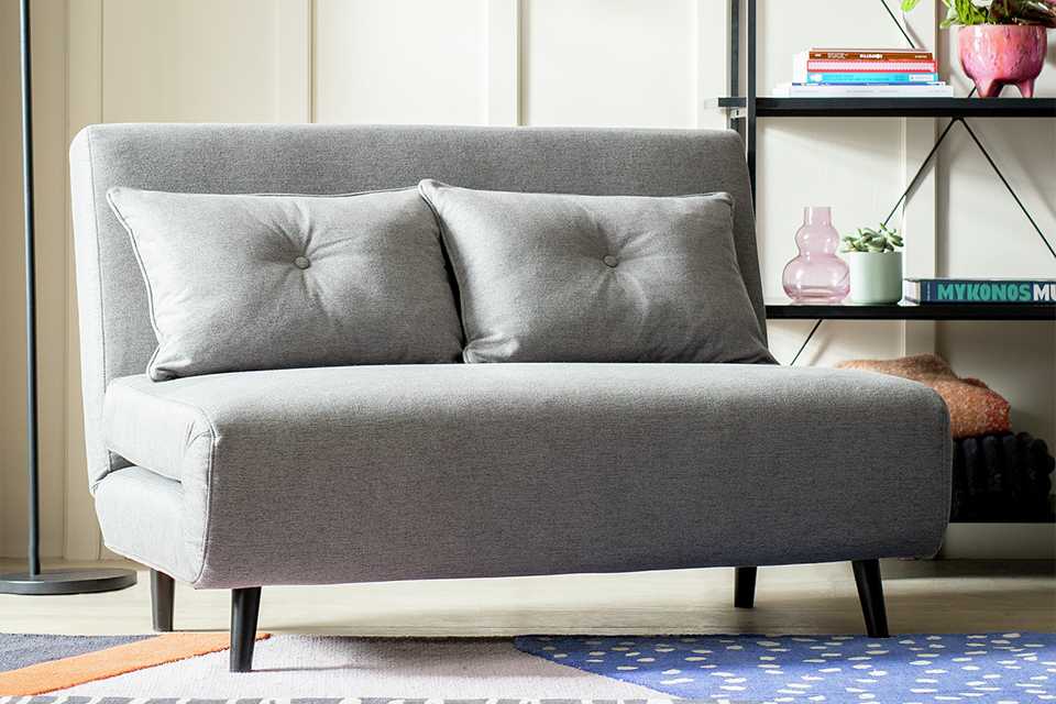 A Habitat small double fabric chair bed in grey.