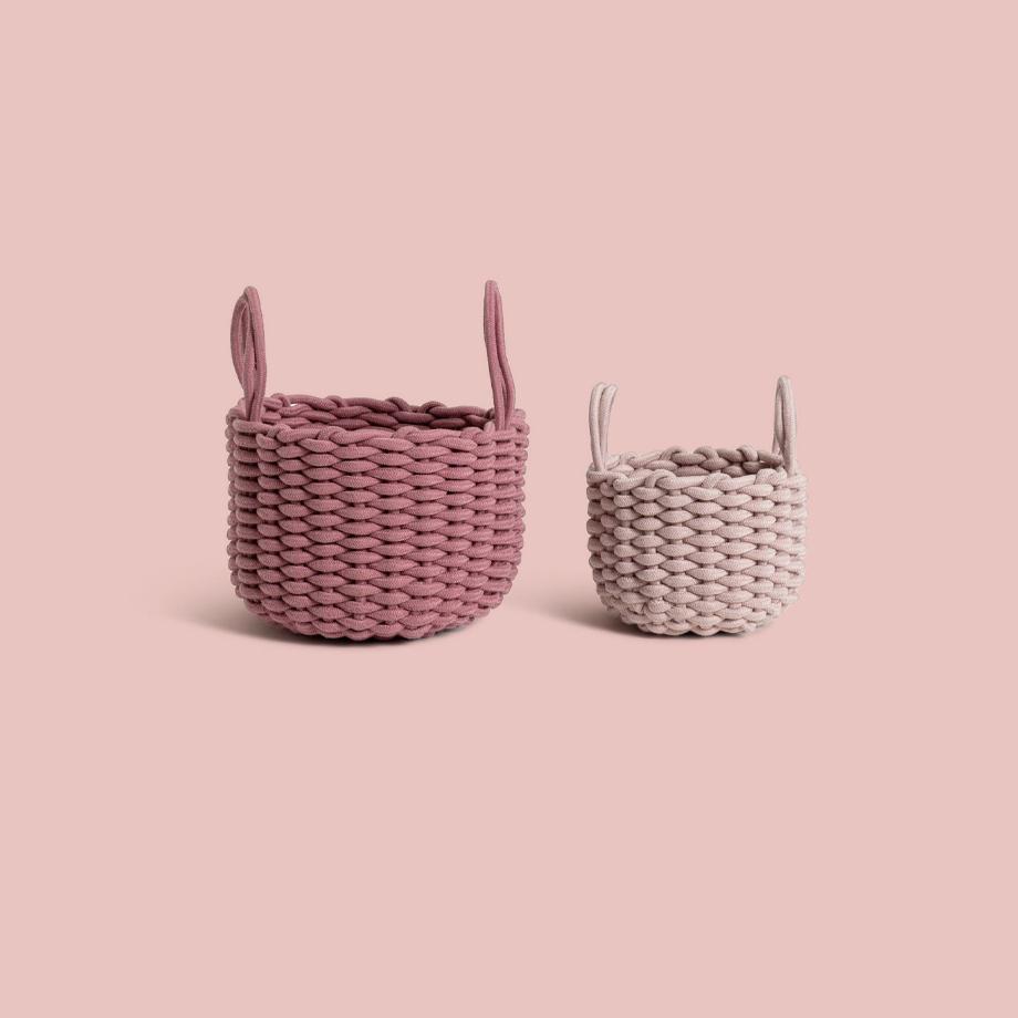 Pair of storage baskets in pink.