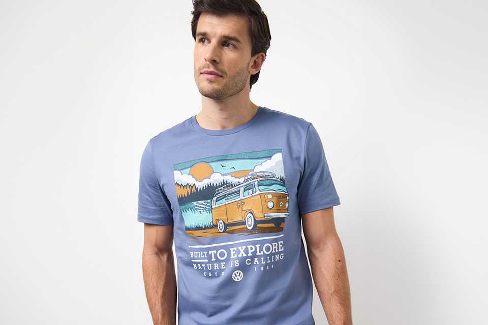 A man in Volkswagen Grey Built To Explore Graphic T-Shirt XL.