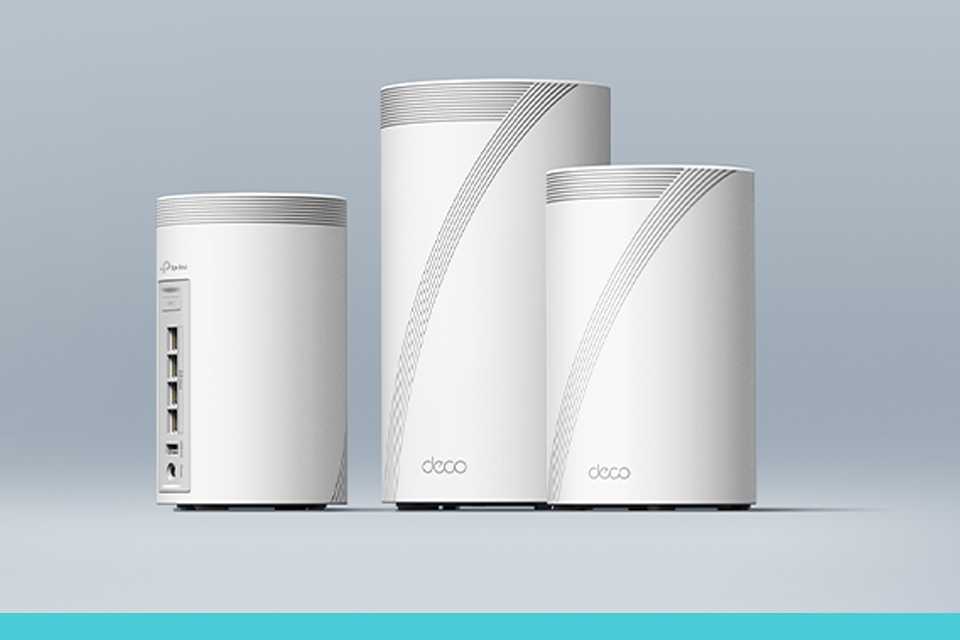 TP-Link Deco Mesh whole home Wi-Fi system against a grey background.