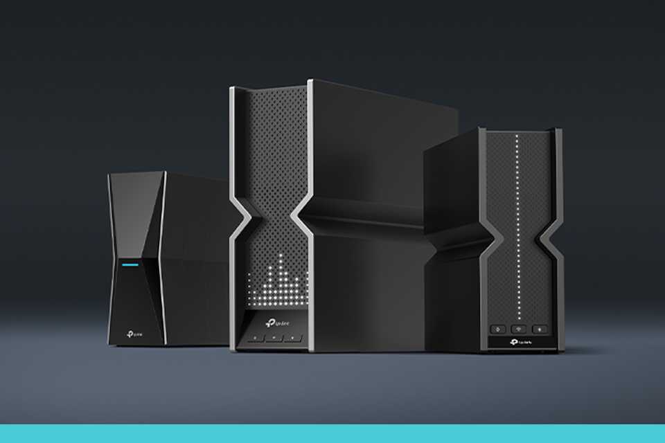 TP-Link dual-band wireless Wi-Fi routers against a black background.