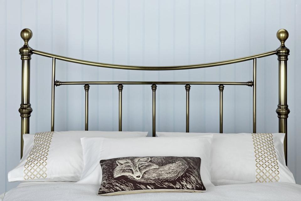 2. Make a statement with a metal headboard