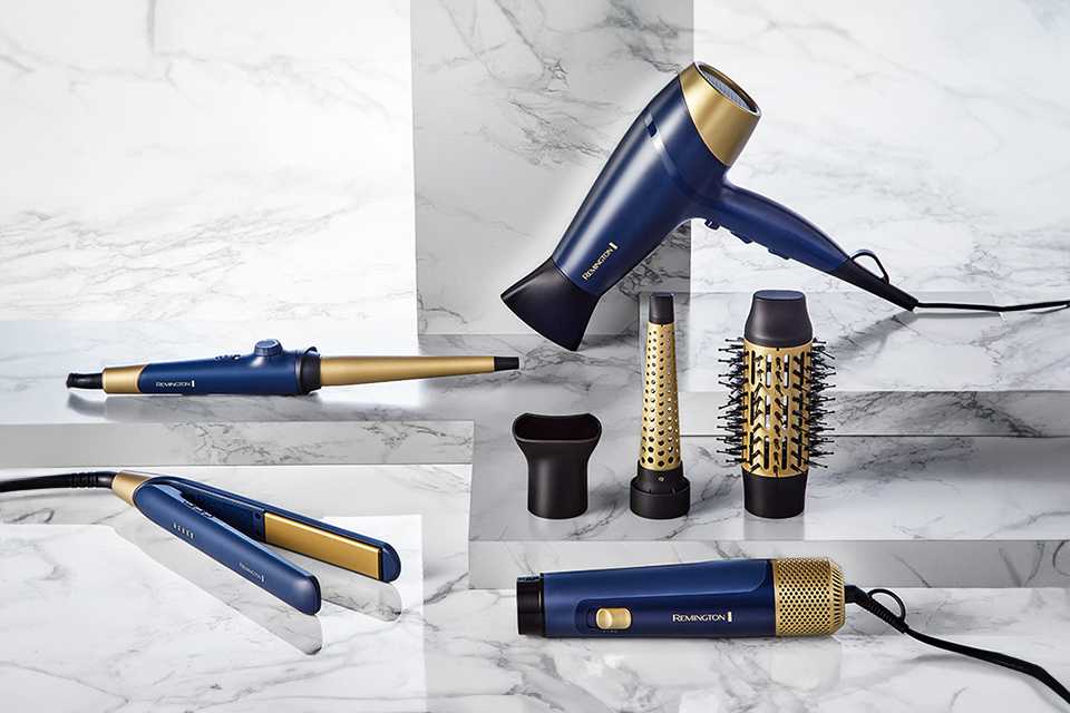 Remington's Sapphire Luxe collection of straightener, hair dryer, curler and more in navy blue and gold colour..