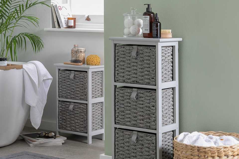 An Argos Home 2 and 3 drawer woven bathroom storage grey unit.