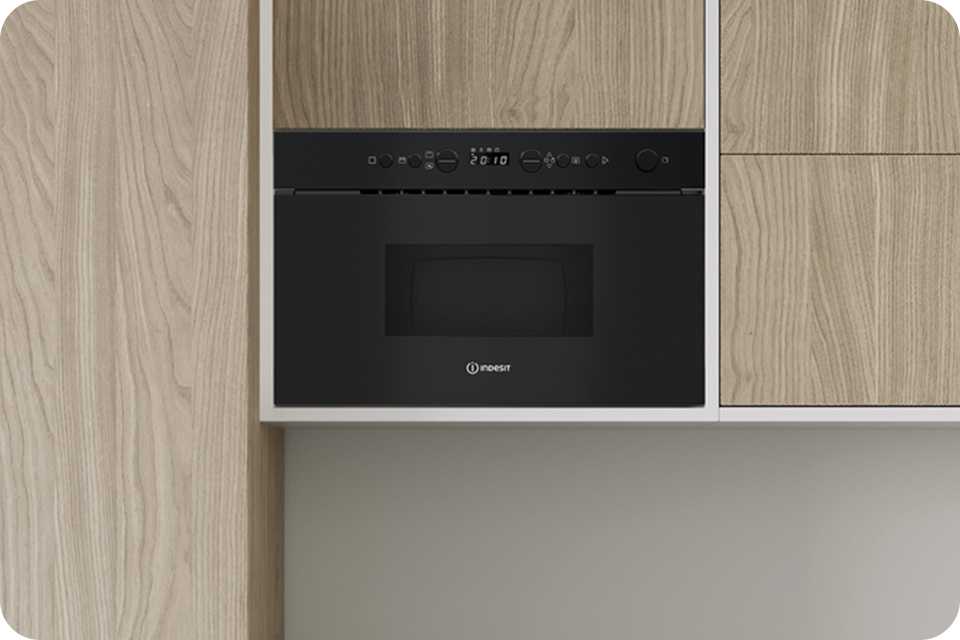 Indesit IMK12BUK 750W Built In Microwave - Black.