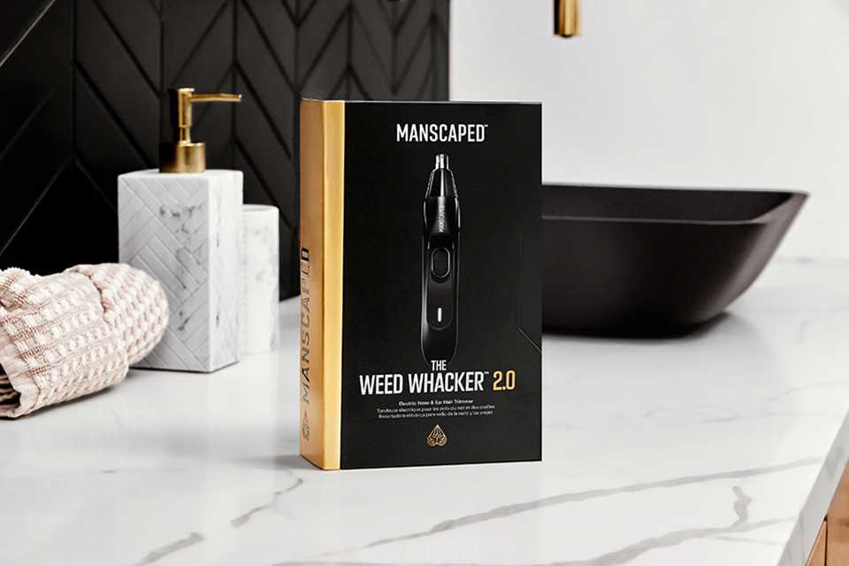 The Manscaped Weed Whacker 2.0 packet kept on an marble bathroom sink.