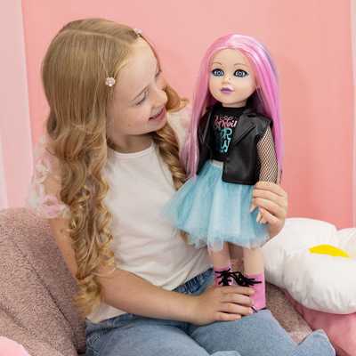 A little girl playing with DesignAfriend 18 Inch Heidi Zombie Doll.