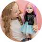 A little girl playing with DesignAfriend 18 Inch Heidi Zombie Doll.