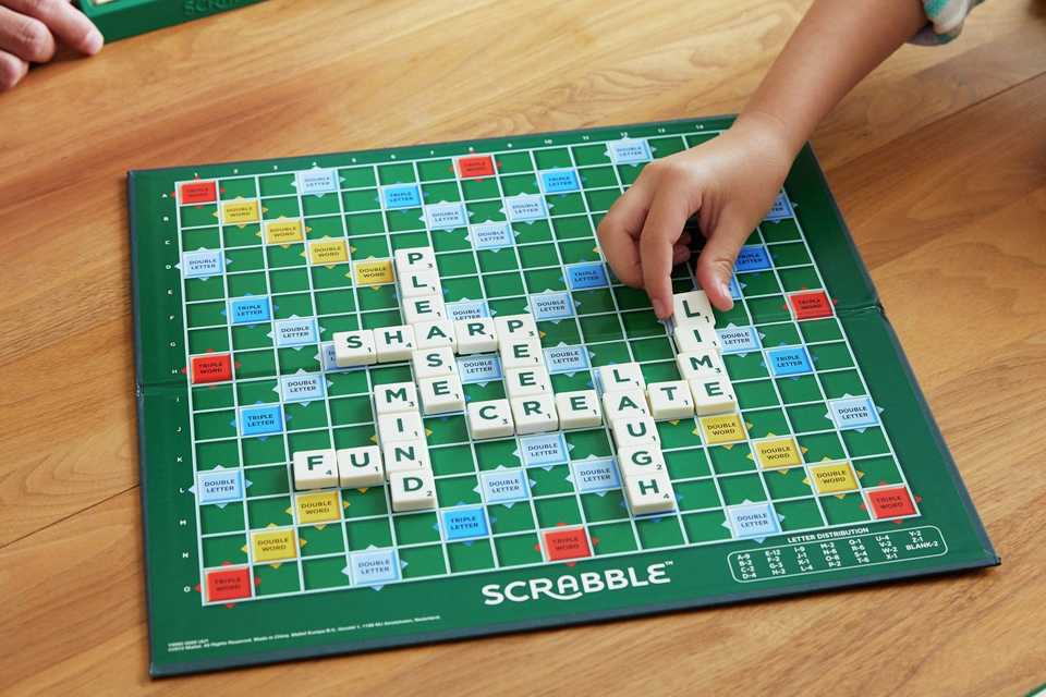 Family playing scrabble.